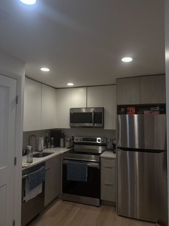 Kitchen - Modern renovated apartment - 1 minute walk to Green Line!