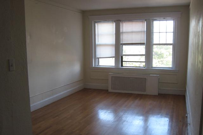 Visit hubrealtyproperties.com - Fabulous one bedroom in condo building, close to campus