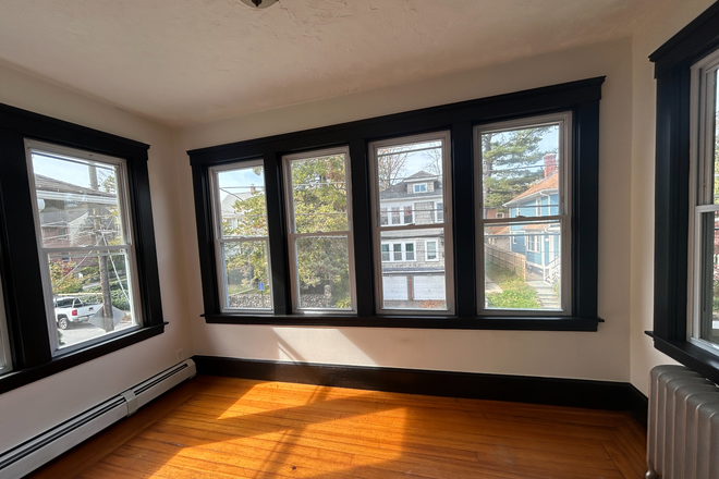 Front office/sun room facing Morris Ave (West) - Sunny, Spacious 2-BR with Office, Steps from Brown Stadium Apartments