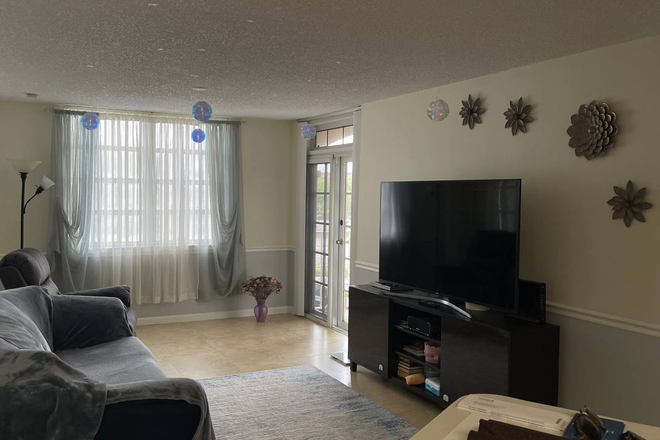 Living Room - University Inn Apartments