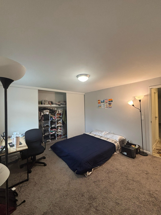 Fully Furnished Bedroom with Carpet - Lease Transfer at The Boulders Apartments