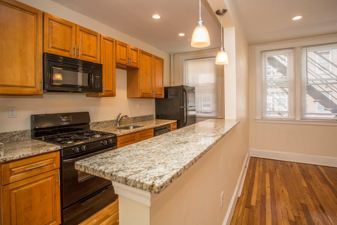 Visit hubrealtyproperties.com - Davis Square, huge studio, with new kitchen and dishwasher