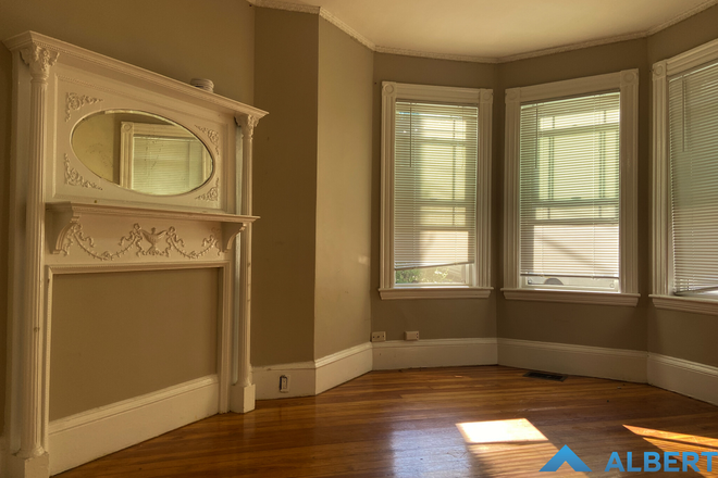 Living Room - 6-Bedroom Duplex on Parker Hill Terrace!!