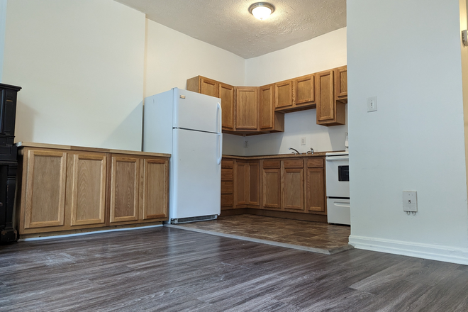 Kitchen - OTR property with parking included by UC Apartments