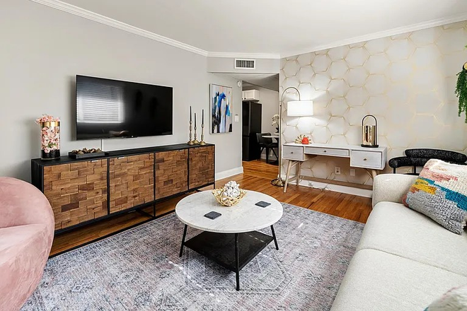 Staged or sample image of living room - Top floor condo steps from beltline in the heart of all things Ponce and Virginia Highlands