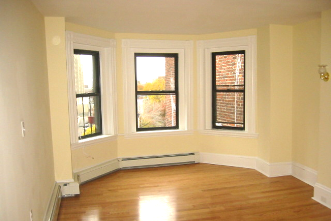 Visit hubrealtyproperties.com - Prime location next to Berklee, renovated 3 bedroom with dishwasher, laundry in unit, A/C
