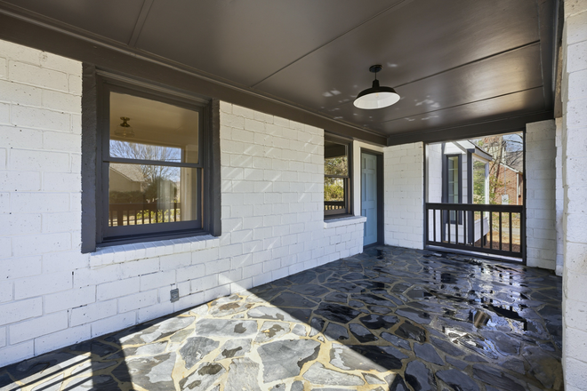 Covered front porch with stone floors - Renovated 2BR Duplex Rental in Decatur, walkable to Whole Foods! Duplex