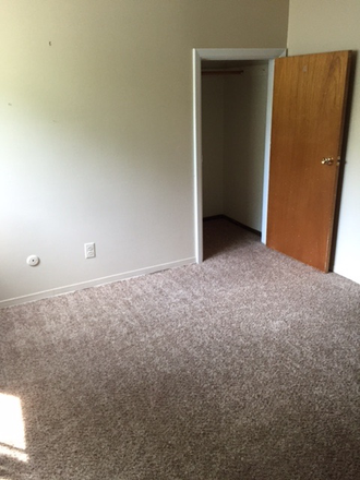 empty bedroom photo - 1 Bedroom 1 BA side by side duplex in quiet neighborhood Duplex