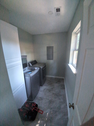 Laundry with storage washer and dryer - Just Outside 1-mile (drive or walk to UNCW): Beautiful 100% renovated home - One Bedroom to rent