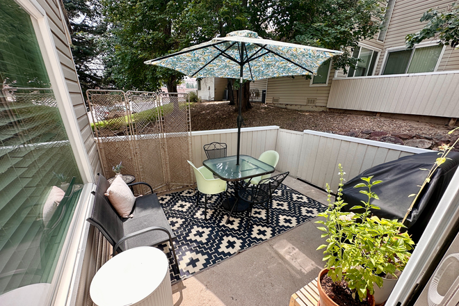 Downstairs patio off Kitchen - Spacious 2-Bedroom Condo in Aurora — Great for CU Denver/DU/Metro Students, Faculty & Staff