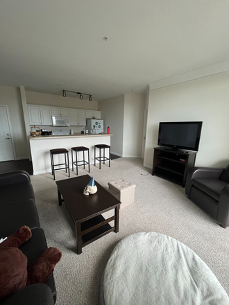 Living Room - Trio Bedroom at The Flats Apartments