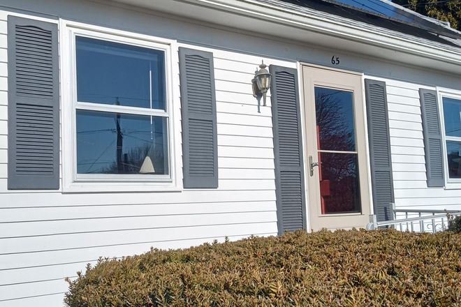 Private front entrance. Up from designated off street parking. - Spacious, furnished one bedroom apartment! Private Second floor in quiet two unit home.
