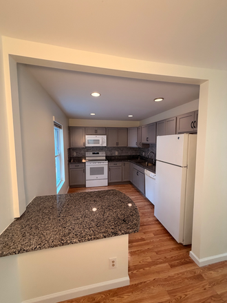 Kitchen - SPACIOUS APARTMENT ON BUS ROUTE
