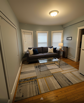 living room (virtually staged) - **NO BROKERS FEE!!* HUGE 5 Bed / 2 Bath w/ Heat&Hot Water Included! Available 9/1/26!!