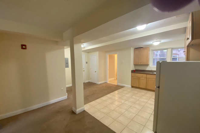 Visit hubrealtyproperties.com - Large one bedroom, basement level, on the T in Mission Hill