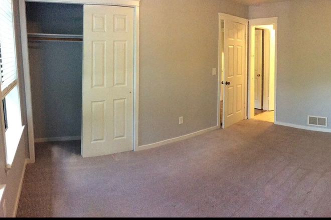 Bedroom Closet - Sunnyside Property Management Apartments