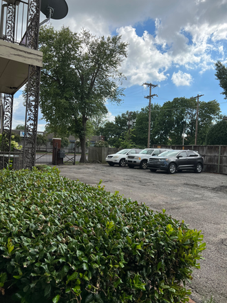 Parking area and remote gate - Gated 1 bedroom/bath close to campus Condo