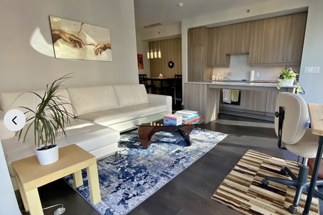 Living Room - 2 bed + Den/1 bath, Fully-Furnished Corner Suite at University & Dundas - utilities included
