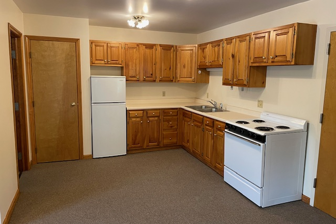 Kitchen and Door from Hallway - Manning Apartments