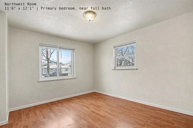 Northwest primary bedroom, $1100 - Rooms in Bright Renovated Home with Backyard Near Anschutz Medical Campus + Stanley Marketplace