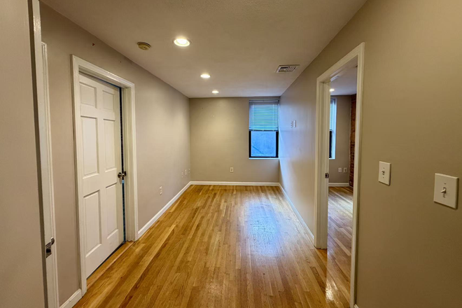 Living Room - Close to Campus, Owner pays Broker Fee, Move-in Concession Available Condo