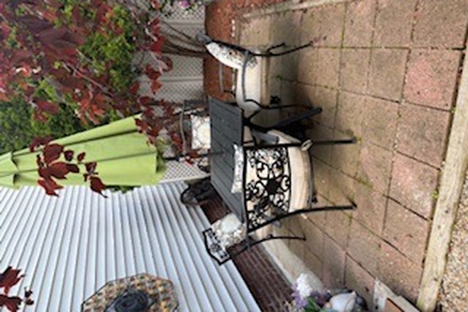 Backyard - Live in the heart of East Somerville. Room for rent in a shared home of professionals.