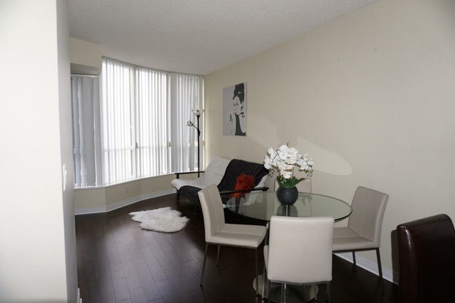 living room with hardwood floor - Safe & Central Student Condo for Rent – Yonge & Bloor 2bds, 1bath, Perfect for U of T & TMU Students