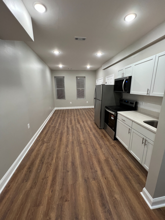 Apt C eat-in-Kitchen and Living Area - Newly Renovated 2BR/2BA | Top 3rd Floor | Near Johns Hopkins