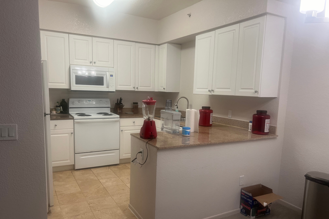 Kitchen - Master bedroom in 3 bed/2 bath apartment at Towers at Costa Verde