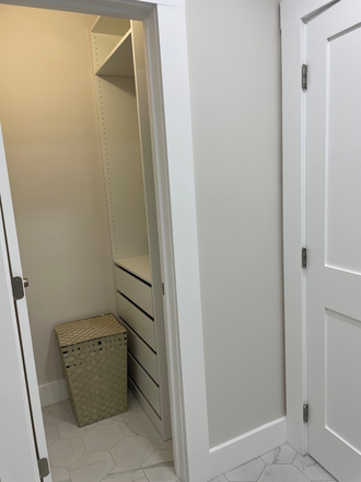 Walk in closet - Furnished Room + Private Bathroom in Coolidge Corner Condo