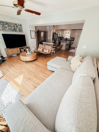 open concept den, dining, and kitchen - Remodeled Townhouse in Avondale, Close to Downtown Charleston