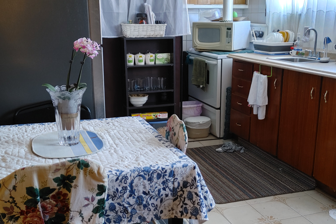 Shared Kitchen and dining area - Private room for rent in a shared basement at Stilecroft Drive House