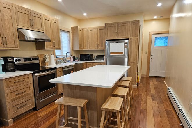 Kitchen - new custom cabinets, quartz, teak hardwood floors, island with stools, dishwasher, new fridge - 4 Bedrooms, 2 bathrooms - NO BROKER'S FEE - Close to Tufts, Davis and Ball Sq.