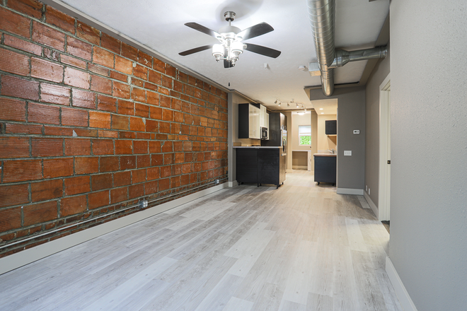 Living room from entry door - Spacious Downtown Omaha 1-Bedroom With In-Unit Laundry