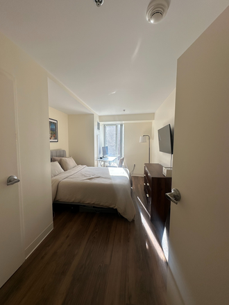 Bedroom - Furnished room for rent in One Western Ave