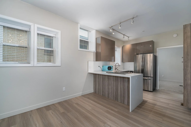 Living room- will be fully furnished - KMH Properties 1016 14th Street