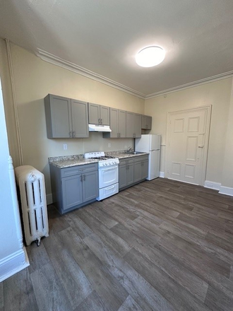 Kitchen - Academic Properties Inc Apartments