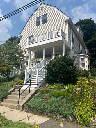 Front of house - unit is 2nd and third floor - 3-bedroom Apt. in beautiful 2-family - steps to bike path, bus, restaurants, Spy Pond