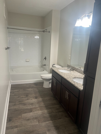 Master Bathroom. To the right is two cabinets for storage as well as under the sinks - Master Bedroom for Rent
