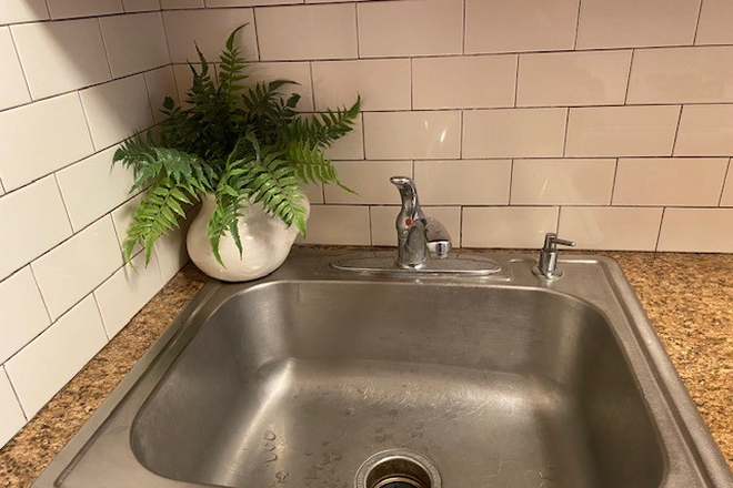 Kitchen - Bright sunny 2 BR with parking, laundry and central AIR Duplex