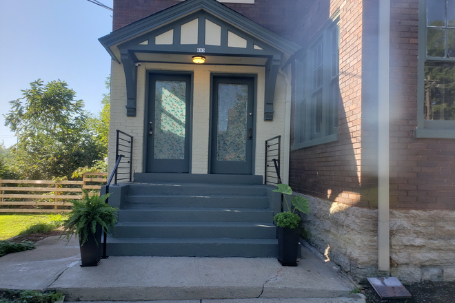 enterance - Completely remodeled 3 bedroom 2nd floor, with covered porch, granite countertops Duplex