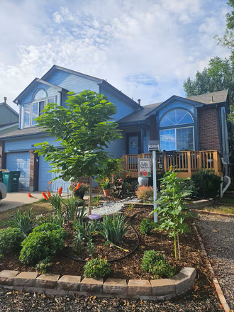 Front of home - Enter Studio through the Garage - Studio Basement Apartment - Furnished with Washer/Dryer!