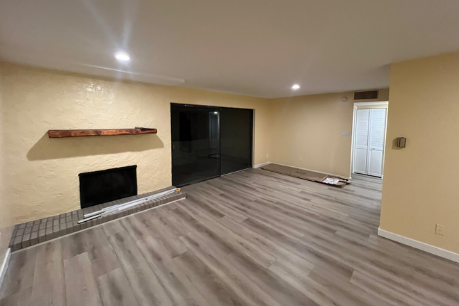 Dining area from the living room and the west facing balcony door - Heart-of-Boulder gem: freshly renovated 2BR 2 BATH
