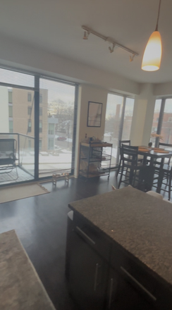 Living room (screenshot from video) - 1 bed Sublet in 1717 Ridge Ave (3B2Ba) for Sept-26, New Luxury and Affordable Building, Close to NU