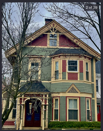 Outside Street View - Victorian House near Bus Stop and Orange Line