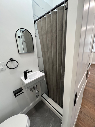 Bathroom - Newly Renovated, Fully Furnished Studio - Includes Wi-Fi Apartments