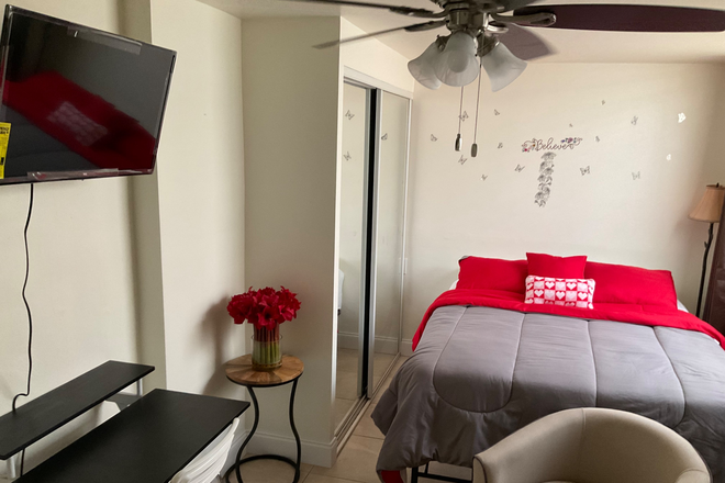 This space has a closet next to the queen bed. - Quiet rental