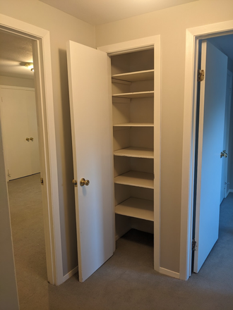 Hallway and Linen Closet - White Oak Condominiums