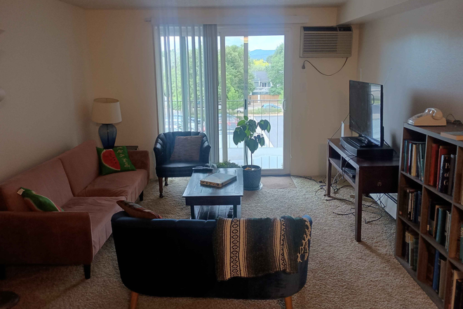 Living room, directly on. - Fourth Floor Boulder Apartment (Glenwood Drive)
