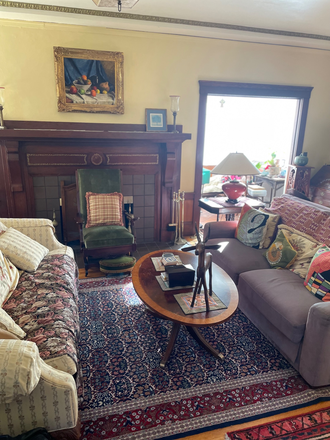 Living room and sun room - Elegant house close to campus transit and Solano Ave shopping